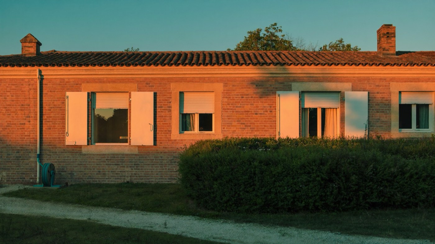Maison toulousaine en brique rose équipée de volets roulants